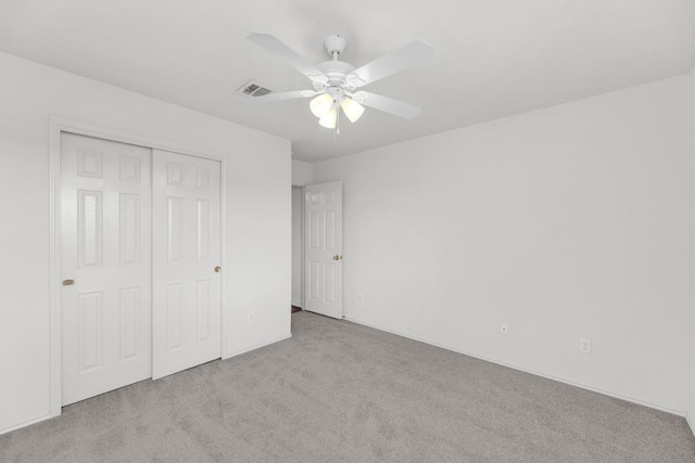 13605 Lyndon B Johnson St, Manor, TX 78653 - unfurnished bedroom featuring carpet floors, a closet, and a ceiling fan