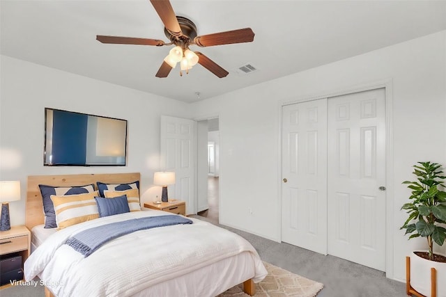 13605 Lyndon B Johnson St, Manor, TX 78653 - bedroom featuring a closet, light carpet, a ceiling fan, and baseboards