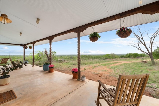 view of patio with a rural view