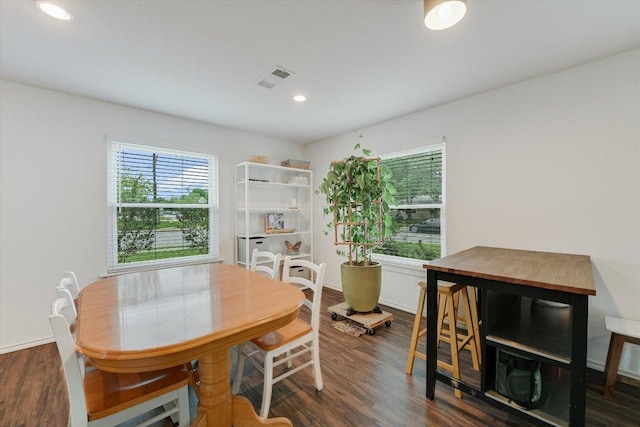 9106 Slayton Dr, Austin, TX 78753 - dining room with plenty of natural light, wood finished floors, recessed lighting, and baseboards