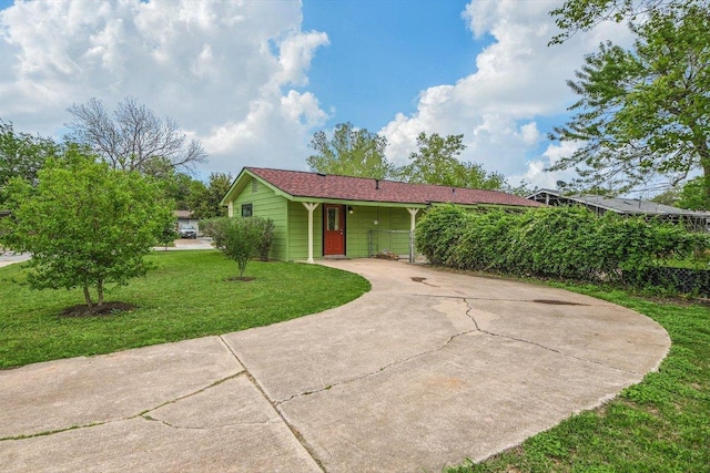 9106 Slayton Dr, Austin, TX 78753 - ranch-style home with concrete driveway and a front yard