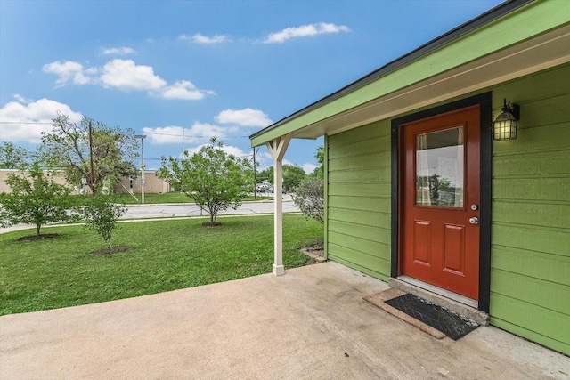 9106 Slayton Dr, Austin, TX 78753 - doorway to property with a yard