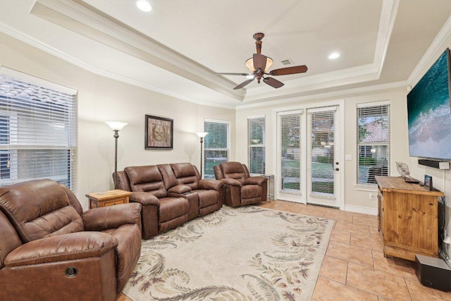 2004 American Dr Unit 1, Lago Vista, TX 78645 - living room with a tray ceiling, ceiling fan, and crown molding