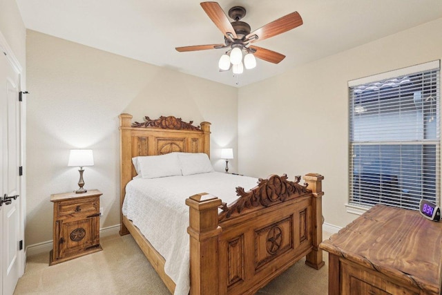 2004 American Dr Unit 1, Lago Vista, TX 78645 - bedroom featuring light carpet, baseboards, and ceiling fan