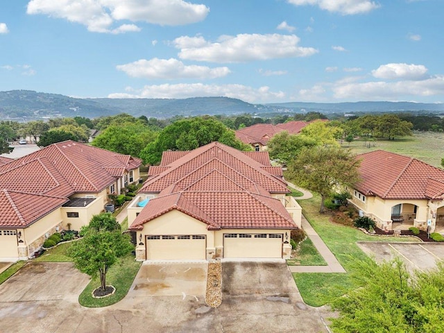 2004 American Dr Unit 1, Lago Vista, TX 78645 - view from above of property with a mountain backdrop