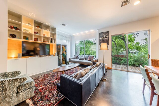 1902 Alegria Rd Unit B, Austin, TX 78757 - living area featuring concrete floors