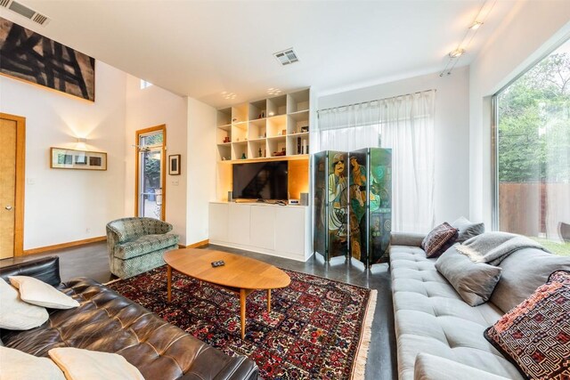 1902 Alegria Rd Unit B, Austin, TX 78757 - living room with baseboards and built in features