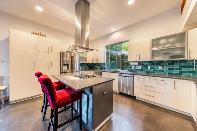 1902 Alegria Rd Unit B, Austin, TX 78757 - kitchen with stainless steel appliances, concrete flooring, island exhaust hood, backsplash, and recessed lighting