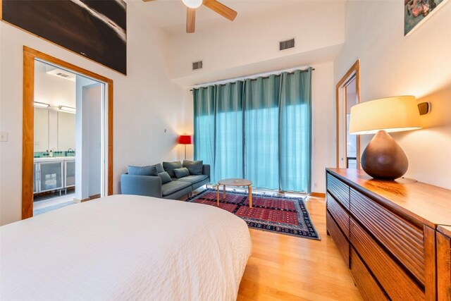 1902 Alegria Rd Unit B, Austin, TX 78757 - bedroom featuring light wood-style floors and ceiling fan