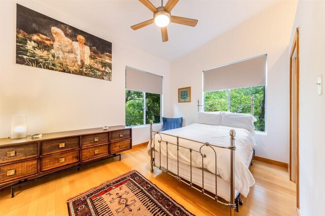 1902 Alegria Rd Unit B, Austin, TX 78757 - bedroom featuring wood finished floors, baseboards, and a ceiling fan