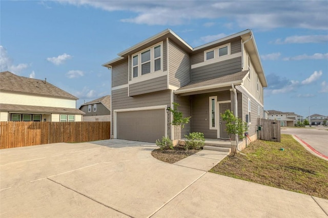 12103 Tolson Dr, Manor, TX 78653 - view of front of property with a garage and concrete driveway
