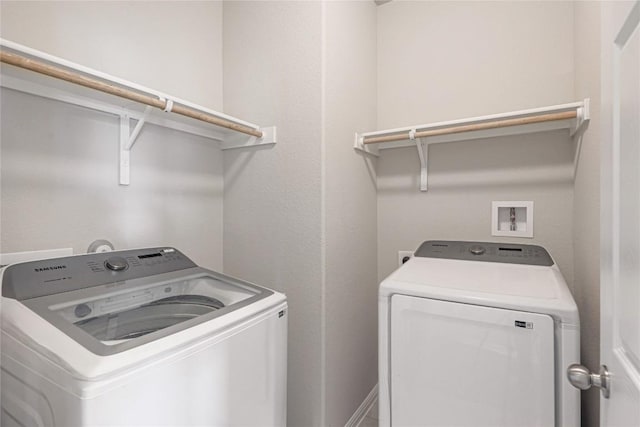 12103 Tolson Dr, Manor, TX 78653 - laundry area with washing machine and dryer