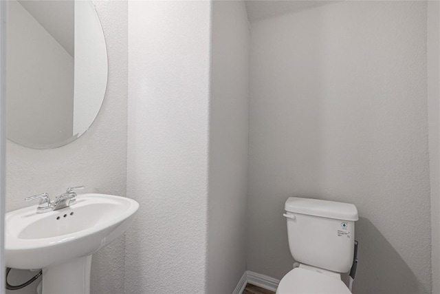 12103 Tolson Dr, Manor, TX 78653 - bathroom featuring toilet and a sink