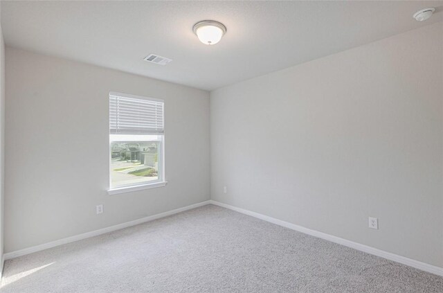 12103 Tolson Dr, Manor, TX 78653 - empty room with carpet floors and a smoke detector