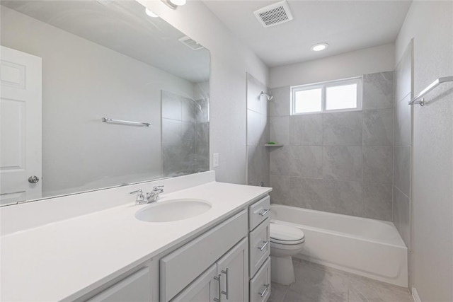 12103 Tolson Dr, Manor, TX 78653 - bathroom with vanity, shower / bathtub combination, tile patterned floors, and recessed lighting