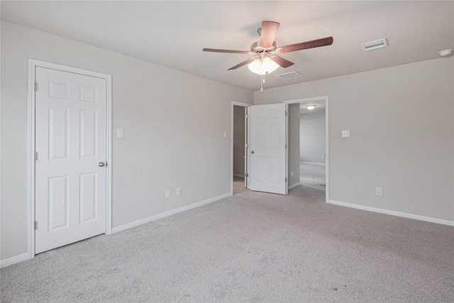 12103 Tolson Dr, Manor, TX 78653 - unfurnished bedroom featuring light carpet and ceiling fan
