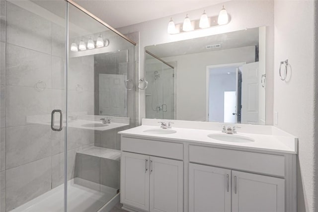 12103 Tolson Dr, Manor, TX 78653 - full bathroom with a shower stall and double vanity