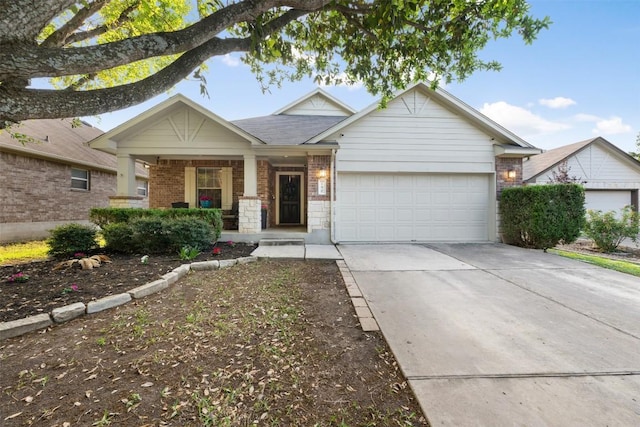 ranch-style house featuring driveway, an attached garage, covered porch, and brick siding