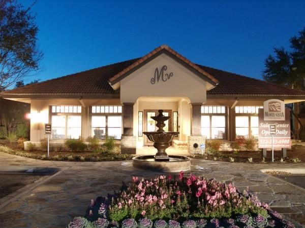 view of property at twilight