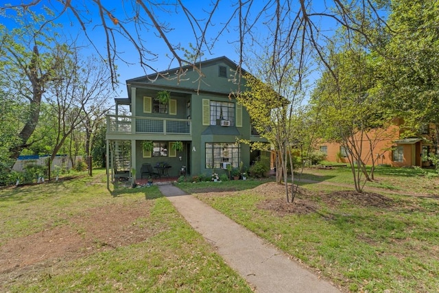 1403 Ashwood Rd, Austin, TX 78722 - back of house with stucco siding, a balcony, stairs, and cooling unit