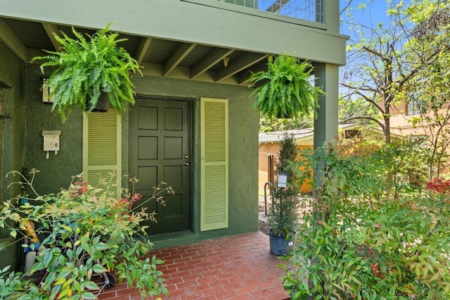 1403 Ashwood Rd, Austin, TX 78722 - property entrance with stucco siding