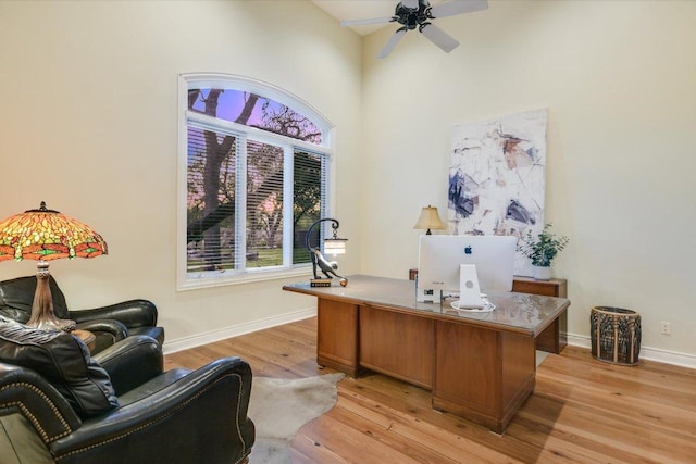 4646 Rockcliff Rd, Austin, TX 78746 - office featuring light wood-type flooring, a ceiling fan, and a towering ceiling
