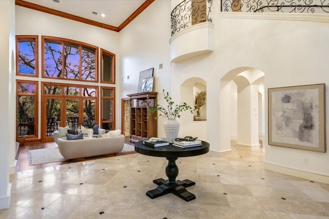 4646 Rockcliff Rd, Austin, TX 78746 - entrance foyer featuring a towering ceiling, crown molding, and tile patterned flooring