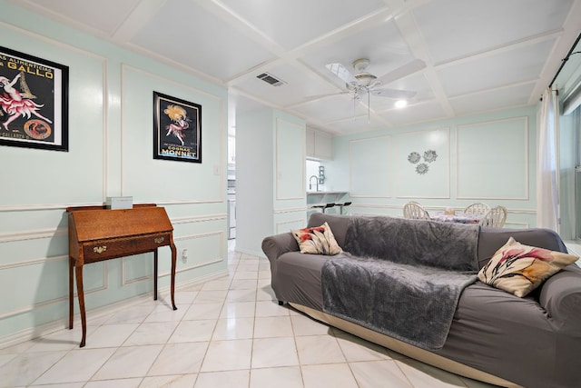 2450 Ashdale Dr Unit D-206, Austin, TX 78757 - living area with a decorative wall, coffered ceiling, and ceiling fan