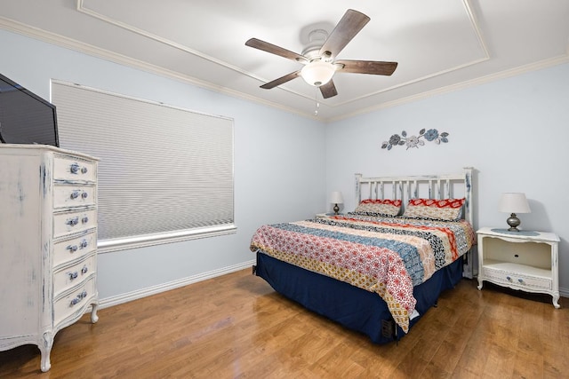 2450 Ashdale Dr Unit D-206, Austin, TX 78757 - bedroom featuring wood finished floors, crown molding, and a ceiling fan