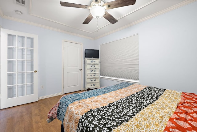 2450 Ashdale Dr Unit D-206, Austin, TX 78757 - bedroom with wood finished floors, crown molding, and a ceiling fan