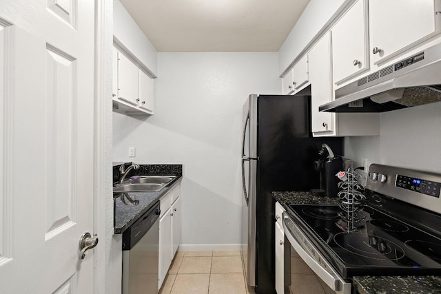 2450 Ashdale Dr Unit B-211, Austin, TX 78757 - kitchen with under cabinet range hood, stainless steel appliances, white cabinetry, and a sink