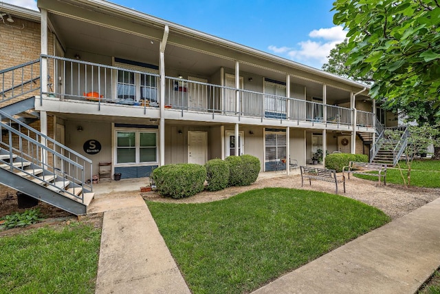 2450 Ashdale Dr Unit B-211, Austin, TX 78757 - view of building exterior with stairway