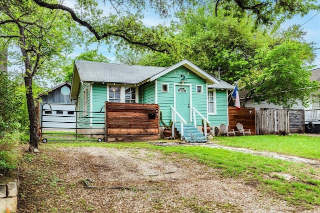 1713 S 5th St, Austin, TX 78704 - view of front facade with entry steps and driveway