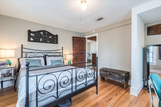 1713 S 5th St, Austin, TX 78704 - bedroom featuring light wood-type flooring and baseboards