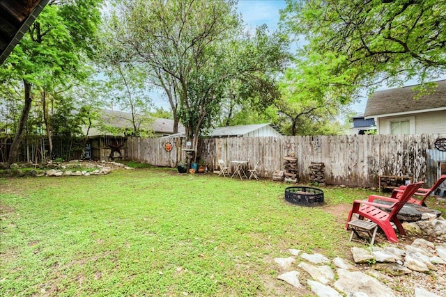 1713 S 5th St, Austin, TX 78704 - fenced backyard featuring a fire pit