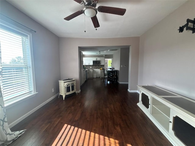 714 Miriam St, Baytown, TX 77520 - hall featuring dark wood-style flooring and baseboards