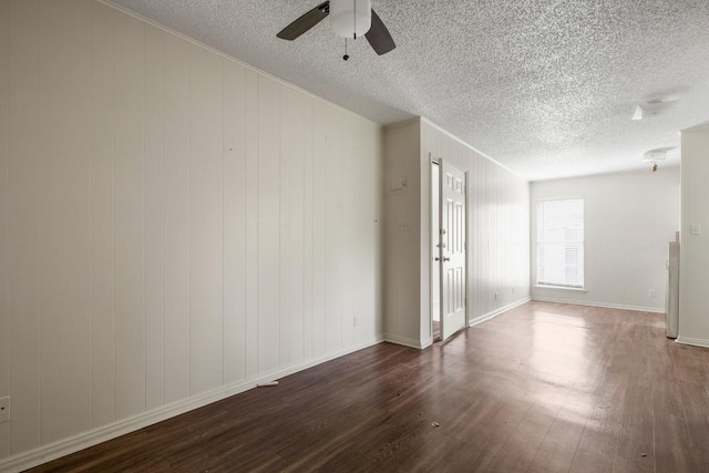 5300 Guadalupe St Unit 6202, Austin, TX 78751 - unfurnished room with dark wood finished floors, a textured ceiling, and a ceiling fan