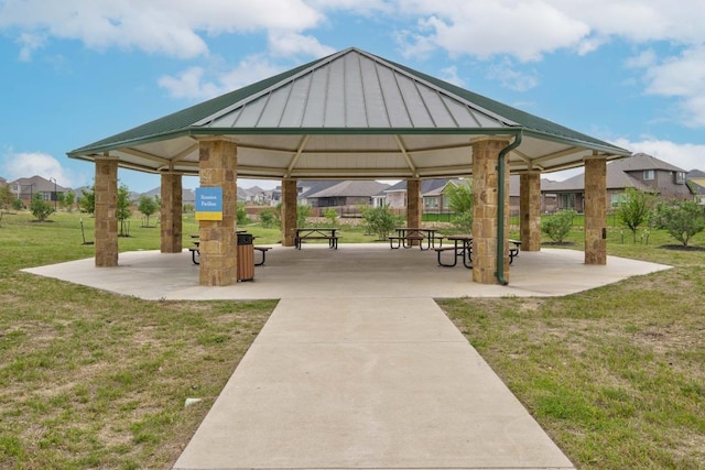 view of property's community featuring a gazebo and a lawn