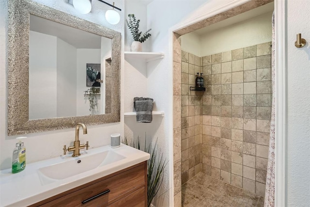 14487 Robert I Walker Blvd, Austin, TX 78728 - full bathroom featuring a tile shower and vanity