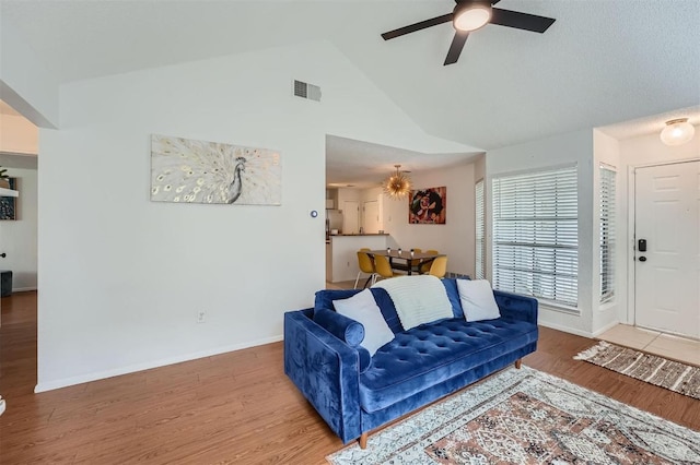 14487 Robert I Walker Blvd, Austin, TX 78728 - living room featuring a ceiling fan, wood finished floors, and lofted ceiling