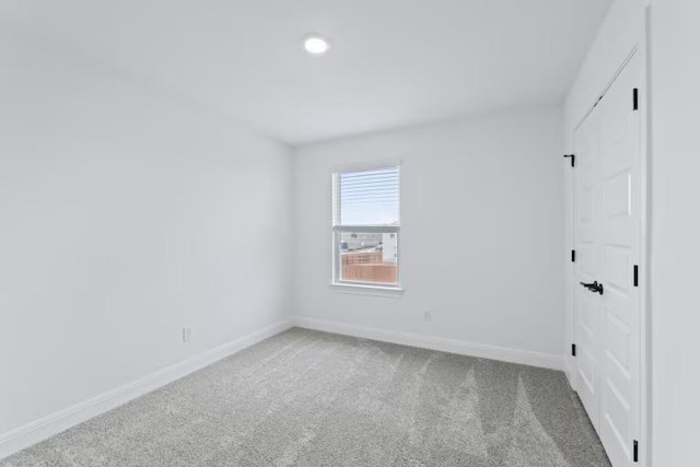 13320 Lapoynor St, Manor, TX 78653 - carpeted empty room with baseboards