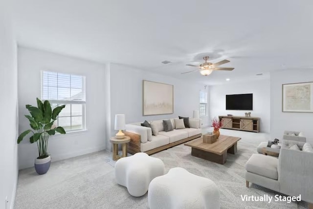 13320 Lapoynor St, Manor, TX 78653 - living room with a ceiling fan and carpet