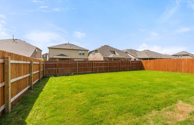 12104 Bacalar Bnd, Manor, TX 78653 - fenced backyard featuring a residential view