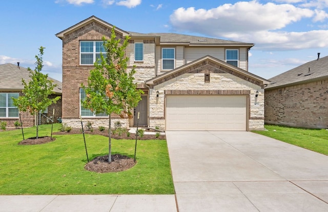 16724 Santiaguillo Trce, Manor, TX 78653 - view of front of property with driveway, stone siding, and a front lawn