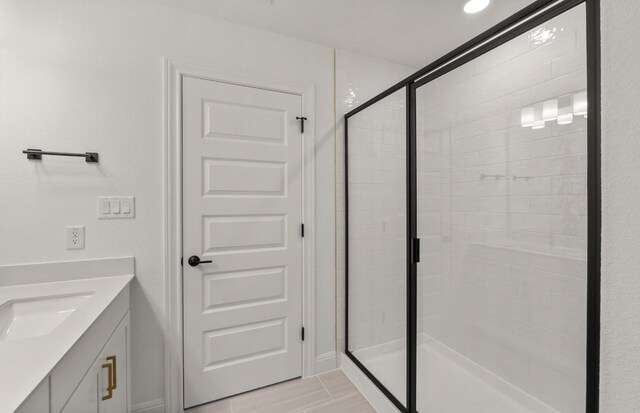 16724 Santiaguillo Trce, Manor, TX 78653 - full bathroom with a shower stall and vanity