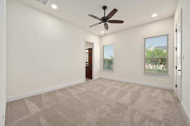 2204 High Lonesome, Leander, TX 78641 - unfurnished room with light colored carpet, recessed lighting, a ceiling fan, and baseboards