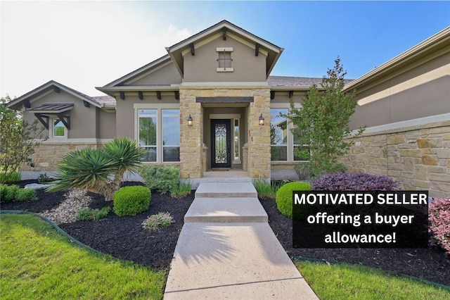2204 High Lonesome, Leander, TX 78641 - property entrance featuring stone siding and stucco siding