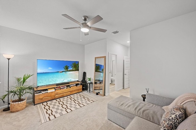 8522 Leroi Dr, Austin, TX 78744 - living room with carpet flooring, ceiling fan, baseboards, and recessed lighting