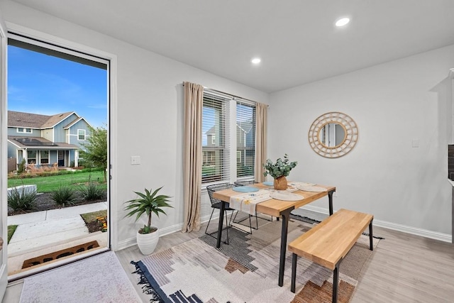 8522 Leroi Dr, Austin, TX 78744 - dining space featuring light wood-style floors and recessed lighting