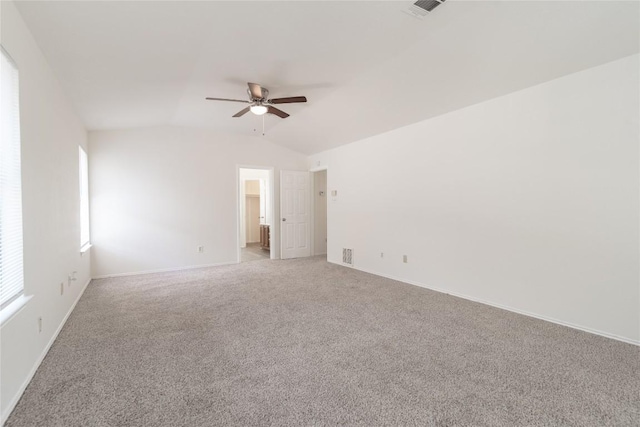 15406 Ecorio Dr, Austin, TX 78728 - carpeted empty room with a ceiling fan, lofted ceiling, and baseboards